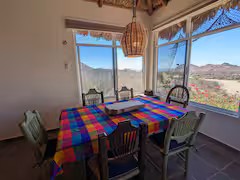 Dining room table inside the main gathering casita